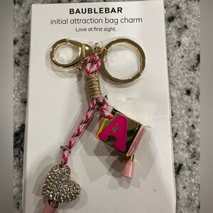 BaubleBar Pink and Gold Initial Bag Charm